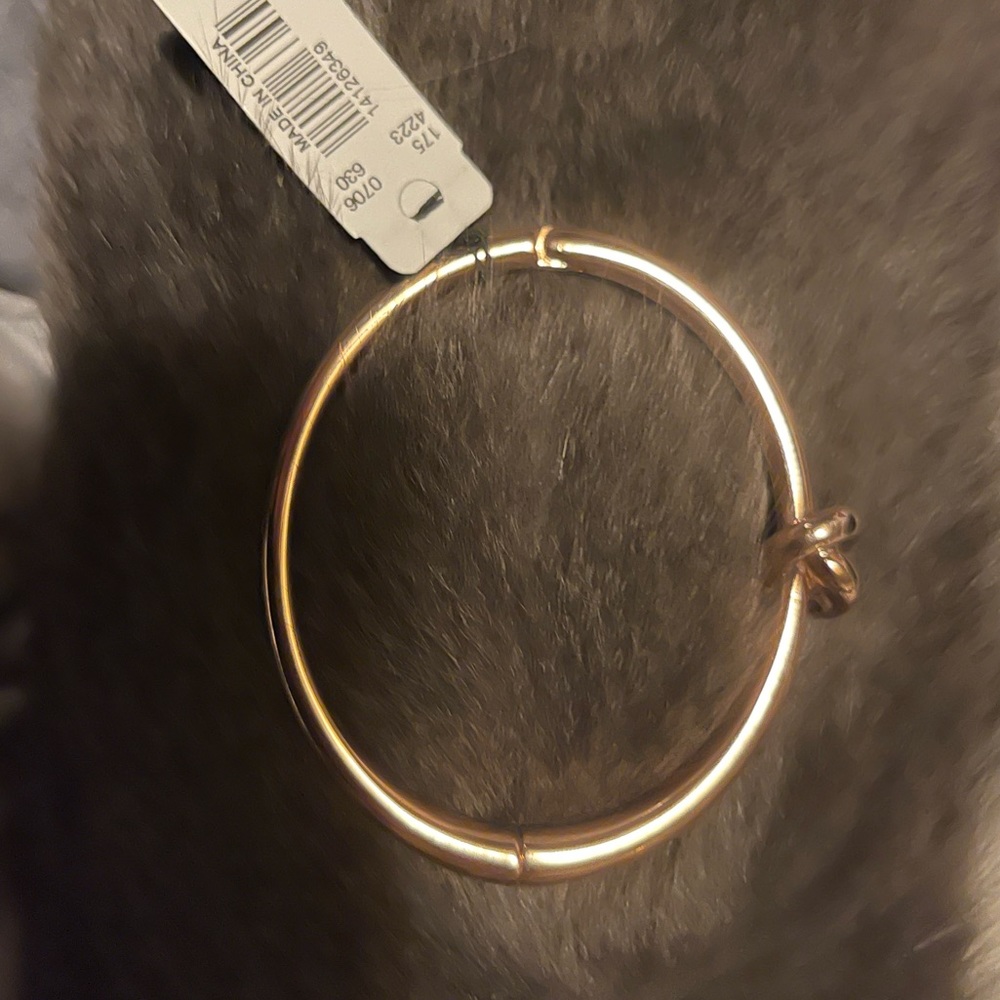 Gold tone  bangle love knot bracelet !
